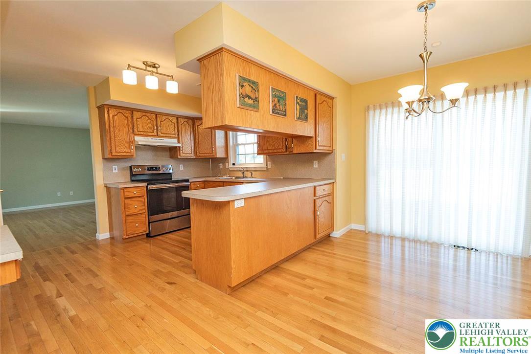 520 5 Points Richmond Road Bangor, PA 18013 - Photo 19 of 48 a kitchen with stainless steel appliances granite countertop a stove a sink and a refrigerator