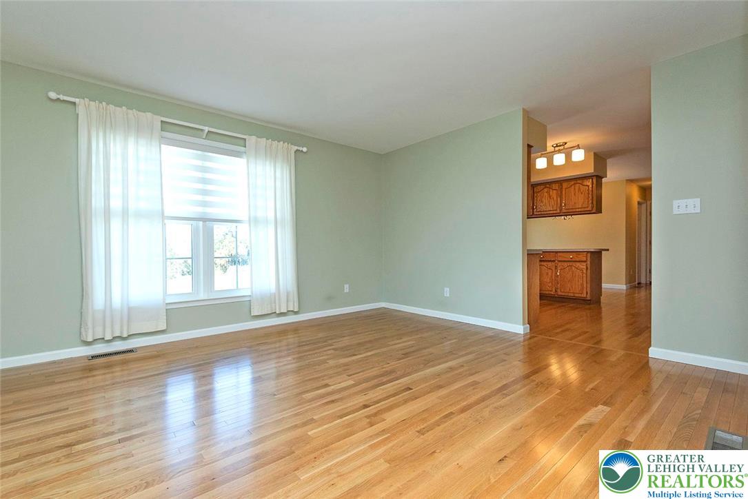 520 5 Points Richmond Road Bangor, PA 18013 - Photo 10 of 48 a view of an empty room with wooden floor and a window