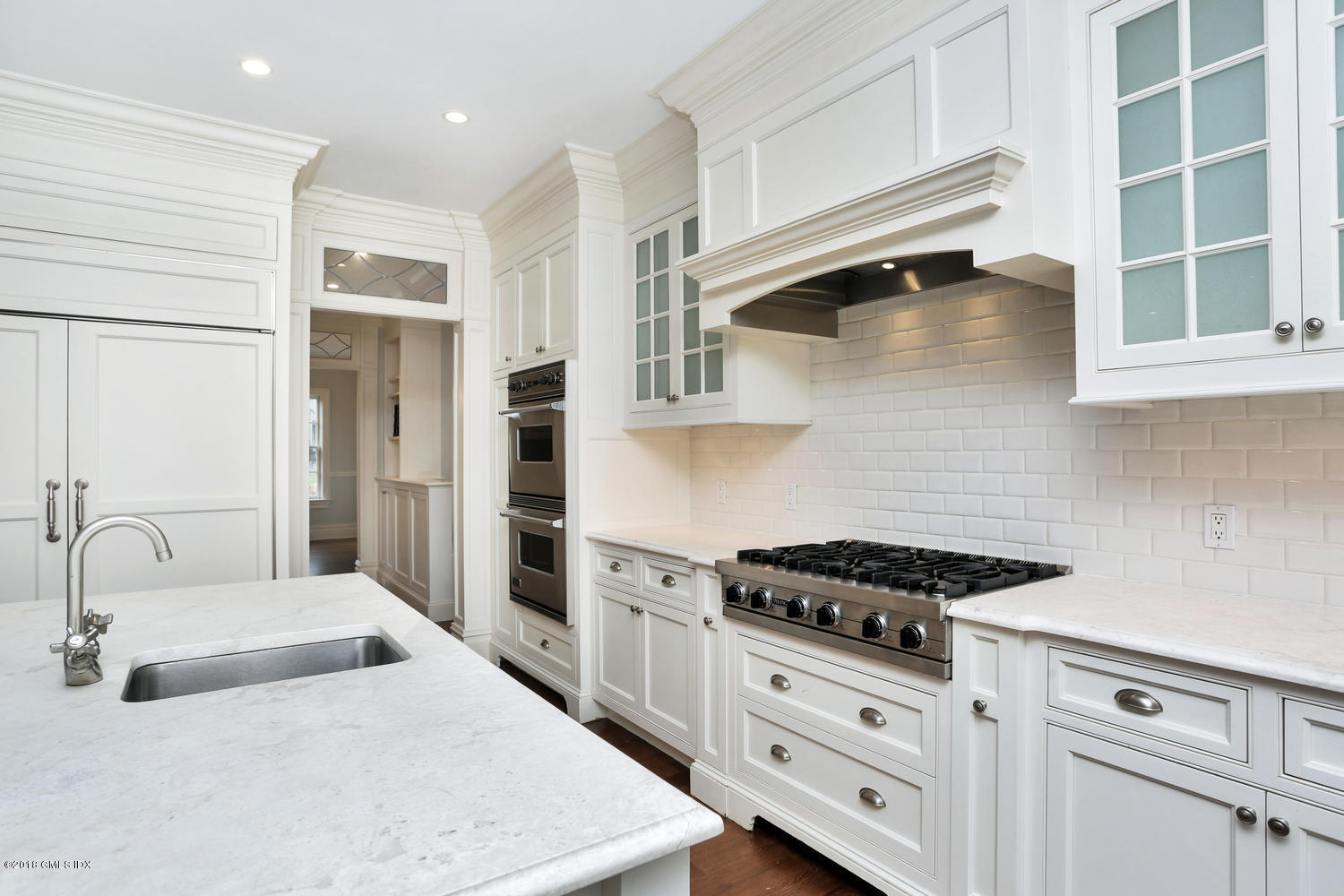 17 Dialstone Lane Riverside, CT 06878 - Photo 12 of 50 a kitchen with stainless steel appliances granite countertop a sink stove and cabinets