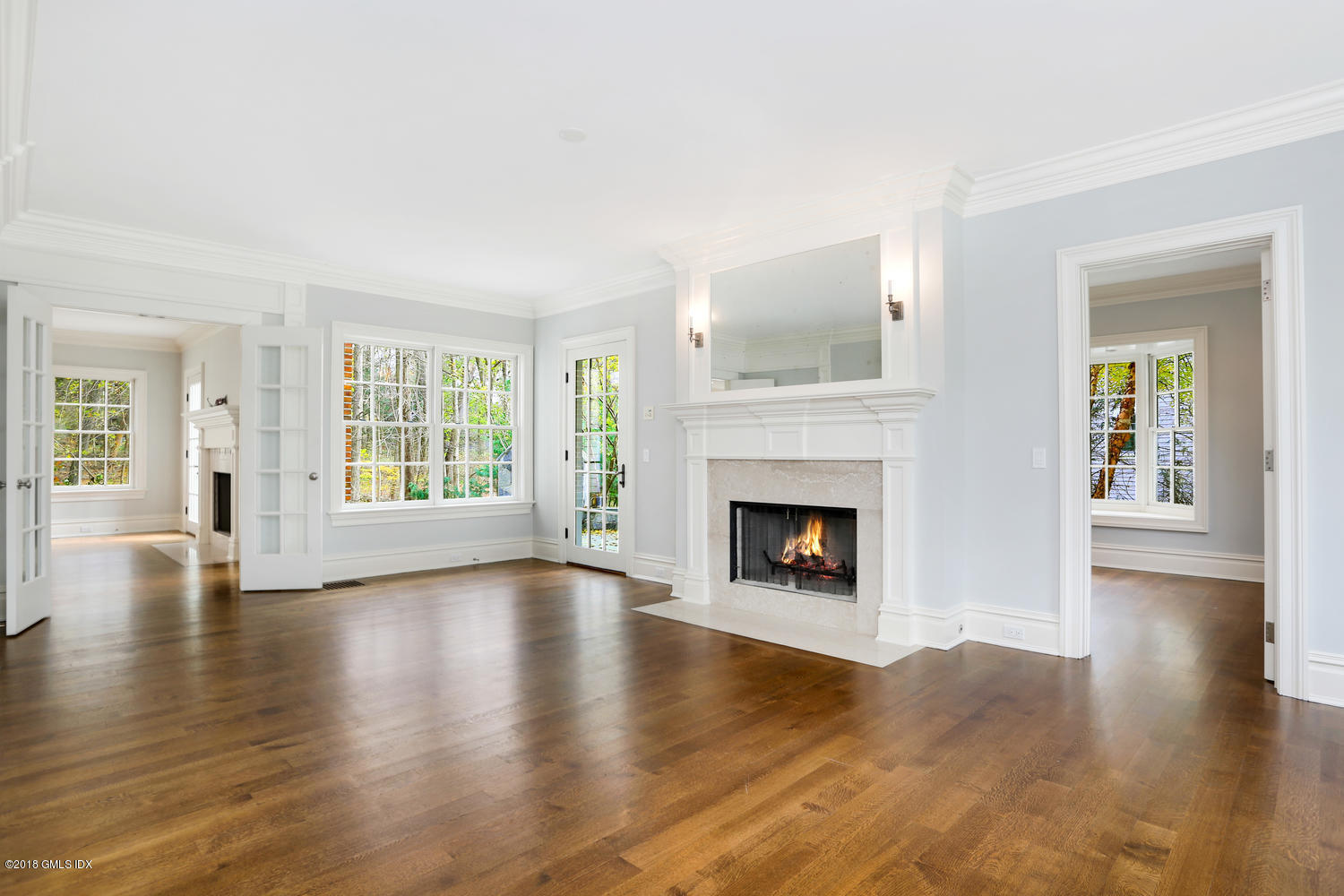 17 Dialstone Lane Riverside, CT 06878 - Photo 21 of 50 a view of an empty room with window and fire place