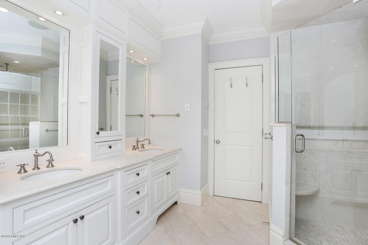 17 Dialstone Lane Riverside, CT 06878 - Photo 27 of 50 a bathroom with a double vanity sink mirror and double