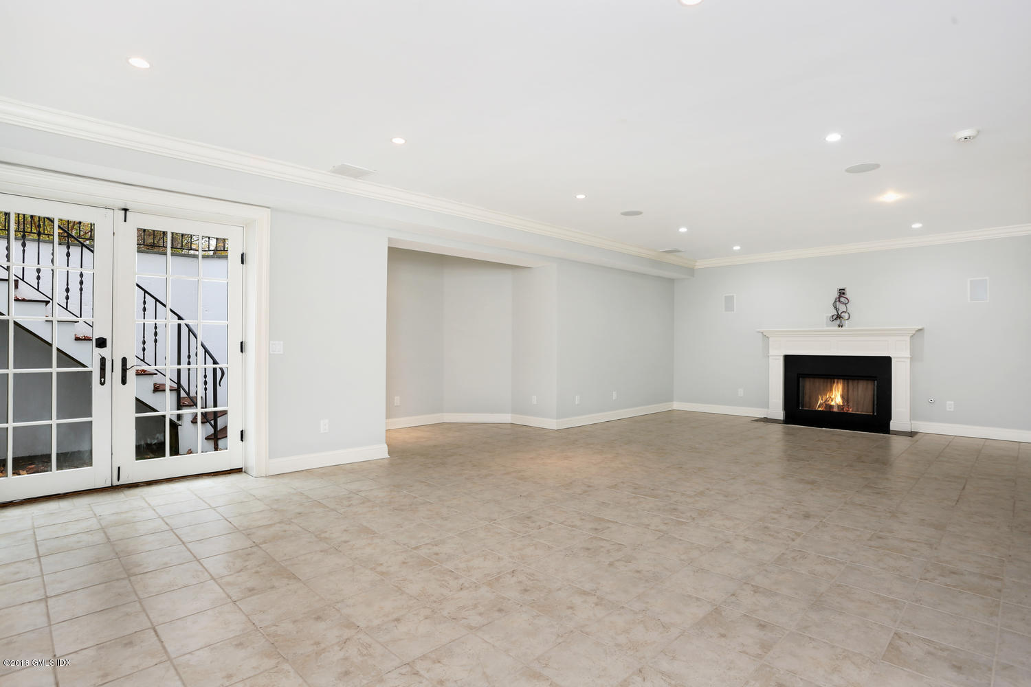 17 Dialstone Lane Riverside, CT 06878 - Photo 32 of 50 a view of an empty room with a fireplace