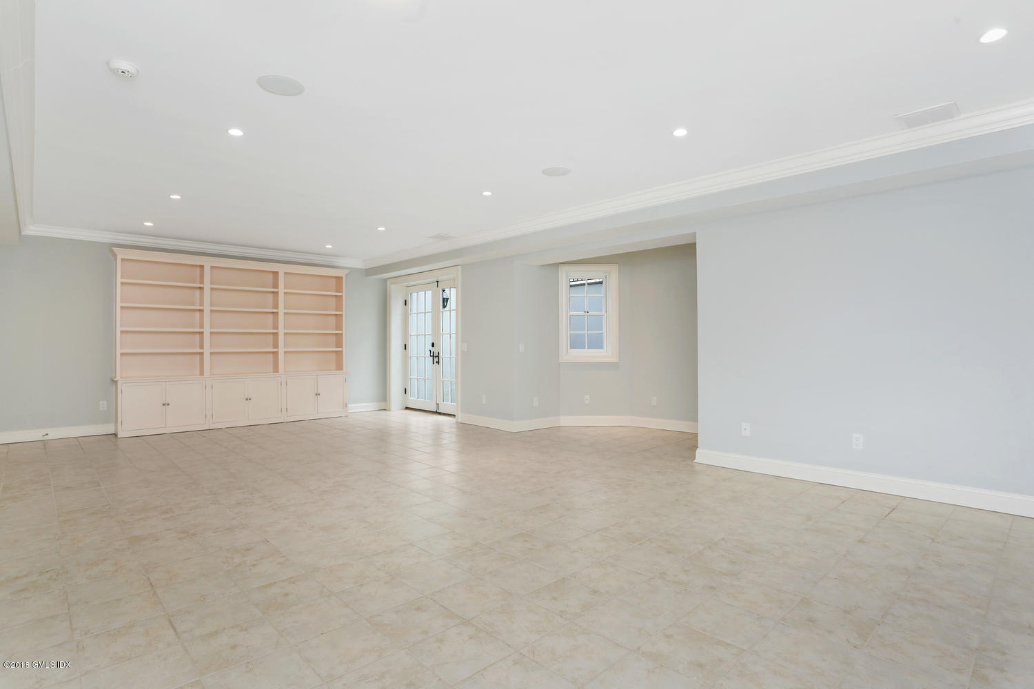 17 Dialstone Lane Riverside, CT 06878 - Photo 33 of 50 an empty room with a empty space and windows