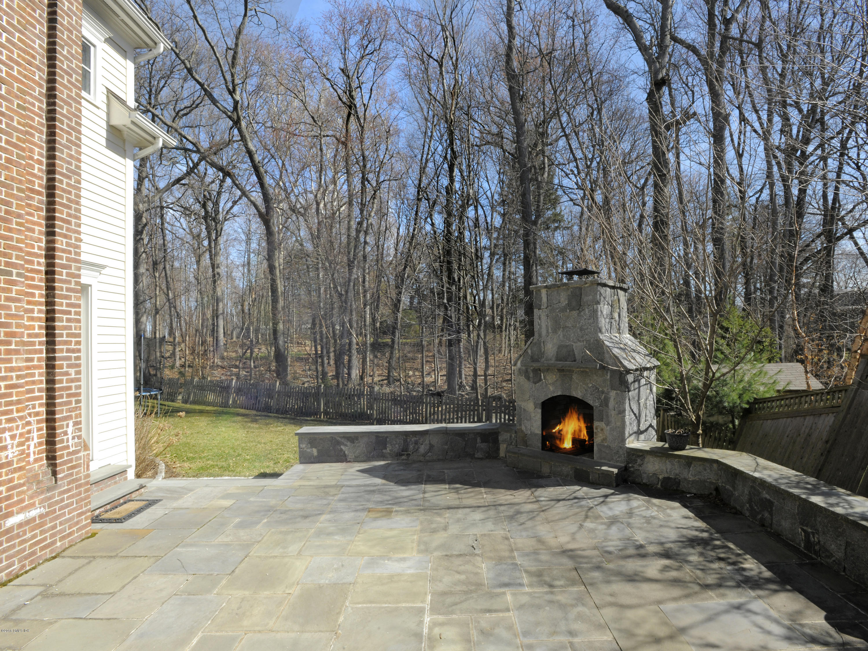 17 Dialstone Lane Riverside, CT 06878 - Photo 38 of 50 a front view of a house with a yard