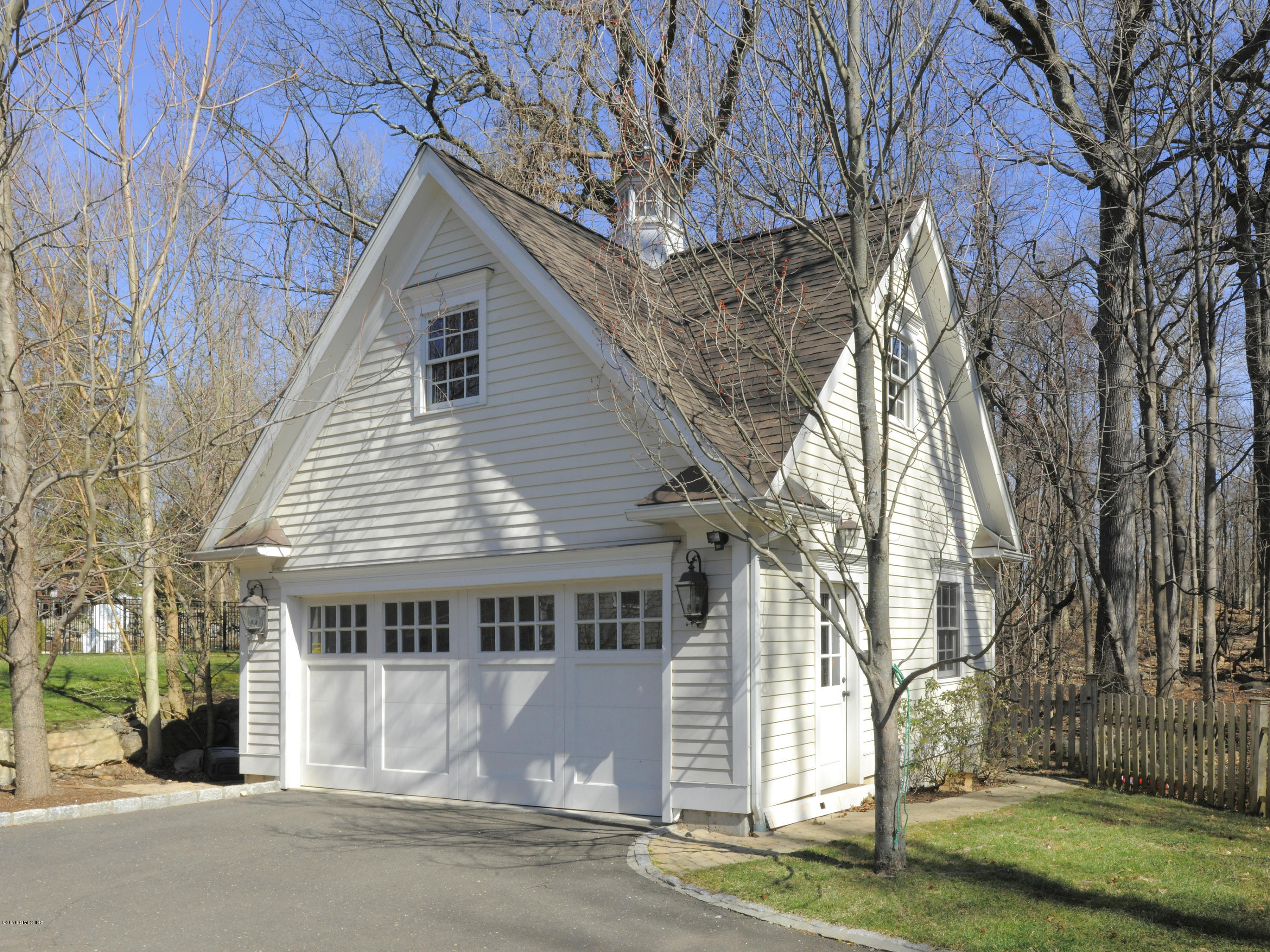 17 Dialstone Lane Riverside, CT 06878 - Photo 39 of 50 a house with trees in front of it