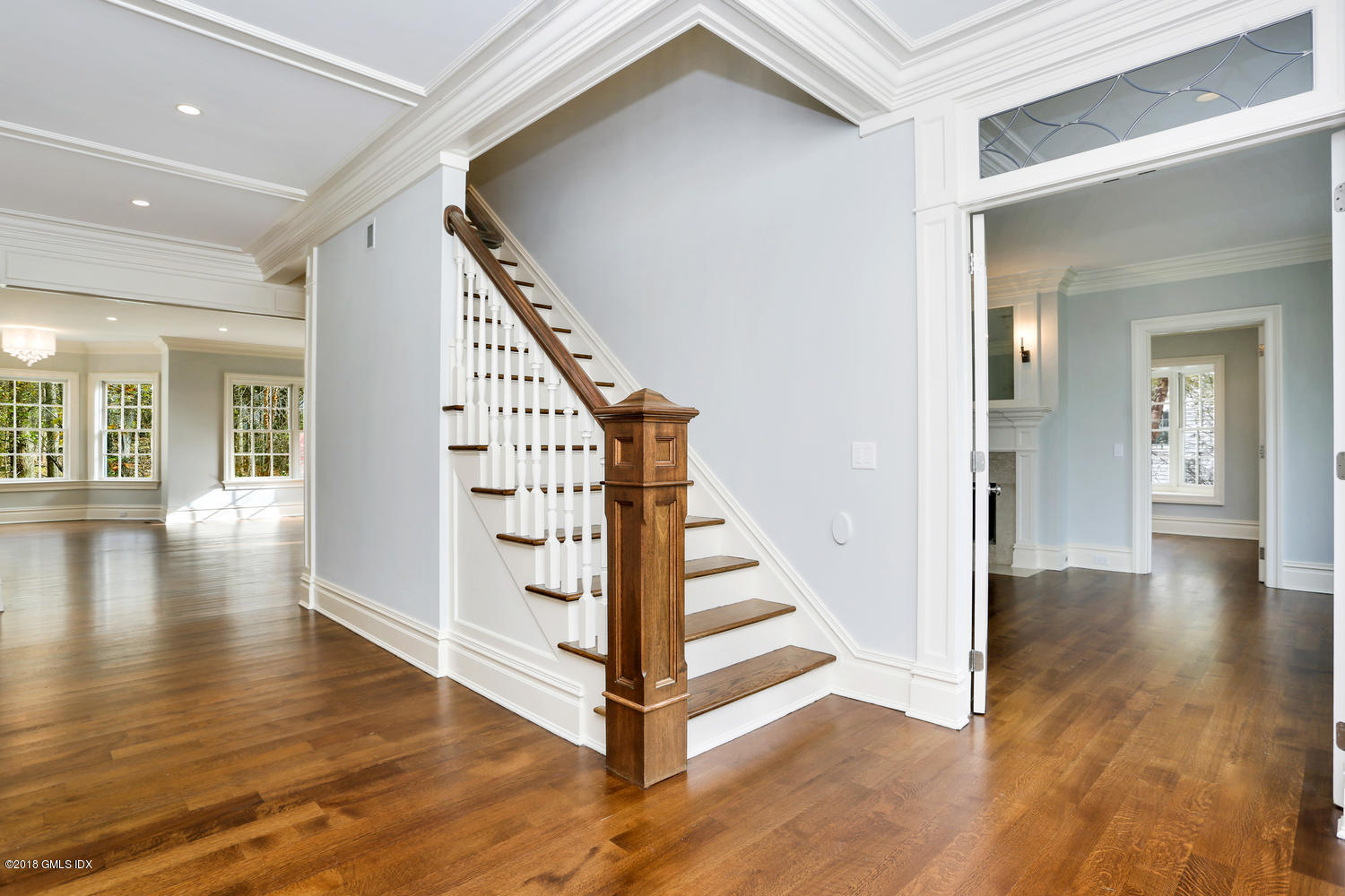 17 Dialstone Lane Riverside, CT 06878 - Photo 4 of 50 a view of a hallway with wooden floor and staircase
