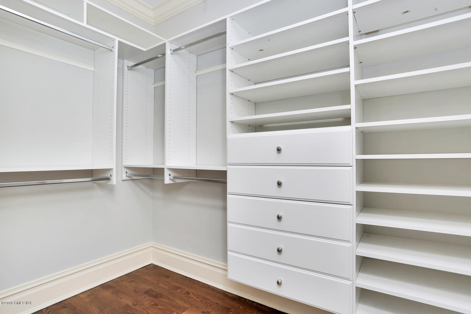 17 Dialstone Lane Riverside, CT 06878 - Photo 43 of 50 a view of walk in closet with empty racks