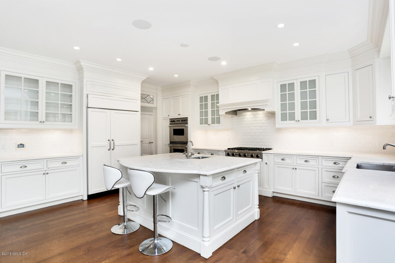 17 Dialstone Lane Riverside, CT 06878 - Photo 47 of 50 a kitchen with a stove a sink and a refrigerator