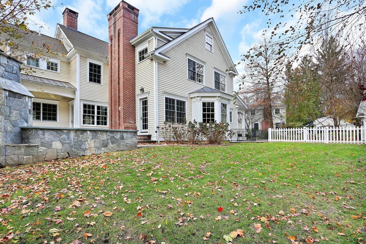 17 Dialstone Lane Riverside, CT 06878 - Photo 48 of 50 front view of a house with a yard
