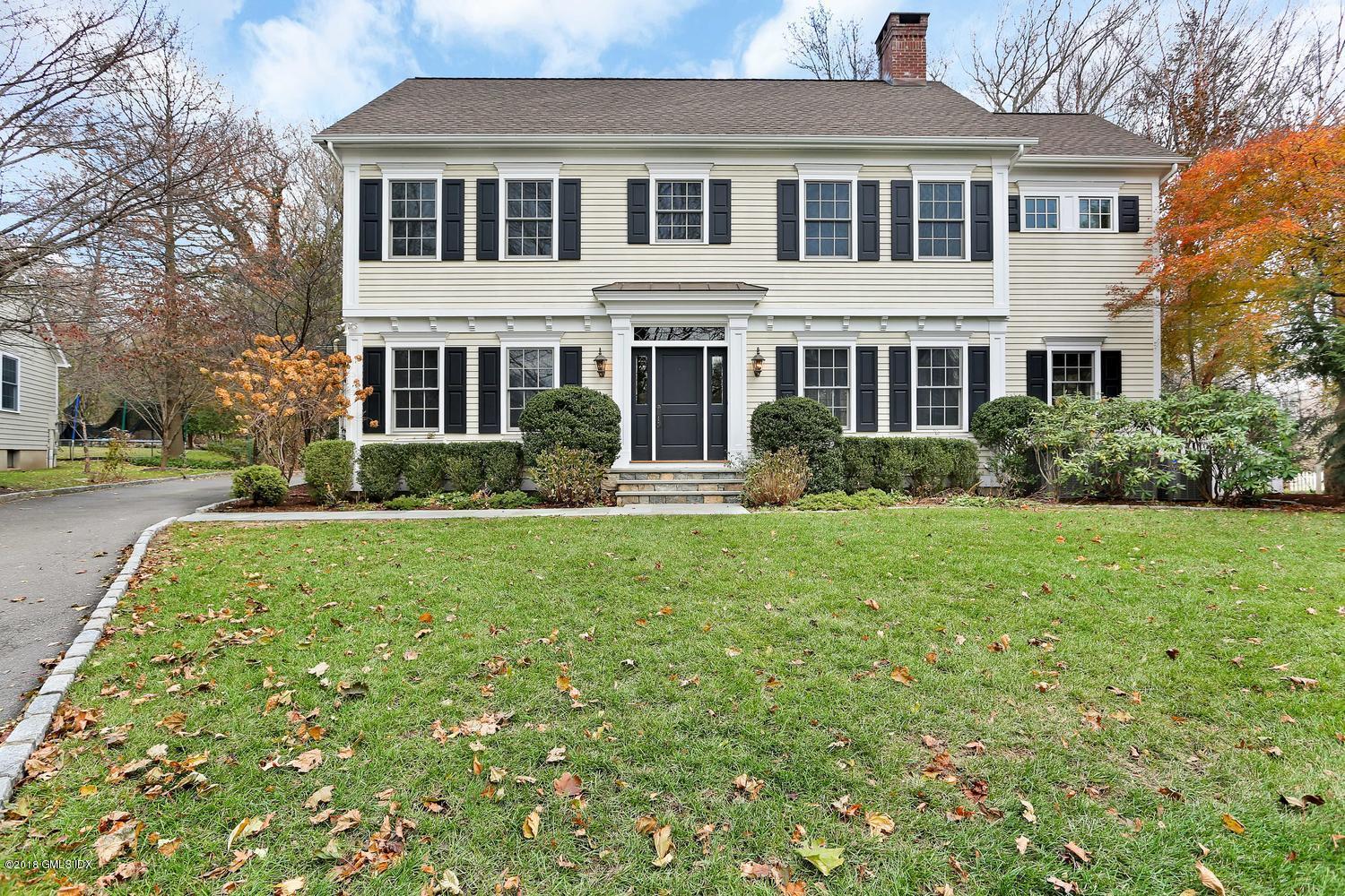 17 Dialstone Lane Riverside, CT 06878 - Photo 49 of 50 a front view of a house with a yard