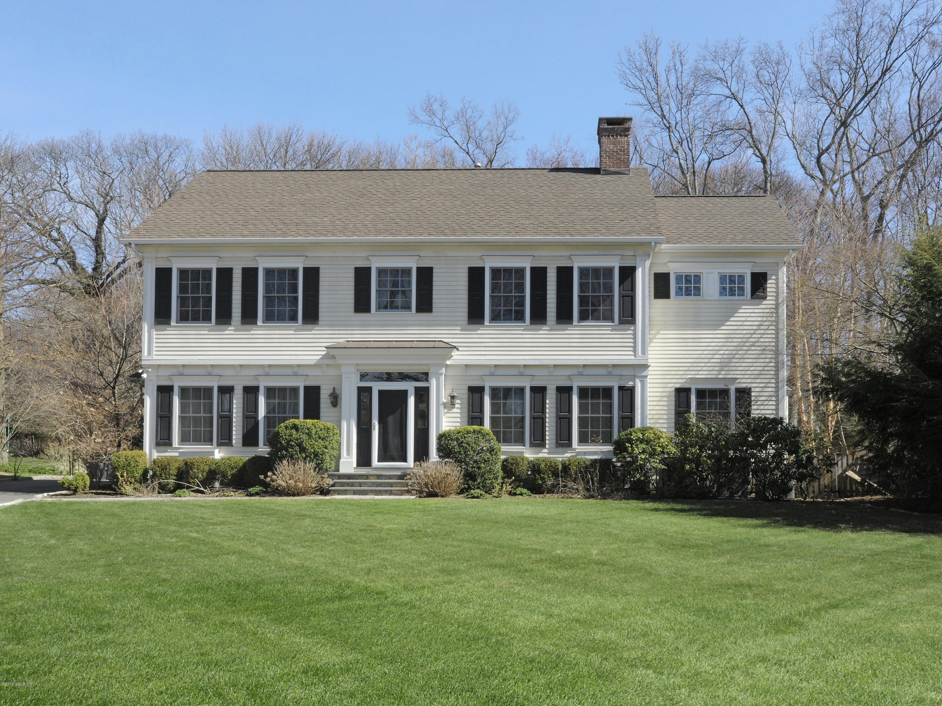 17 Dialstone Lane Riverside, CT 06878 - Photo 50 of 50 a front view of house with yard and green space