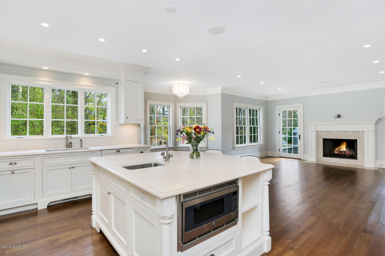 17 Dialstone Lane Riverside, CT 06878 - Photo 9 of 50 a kitchen with sink stove and wooden floor