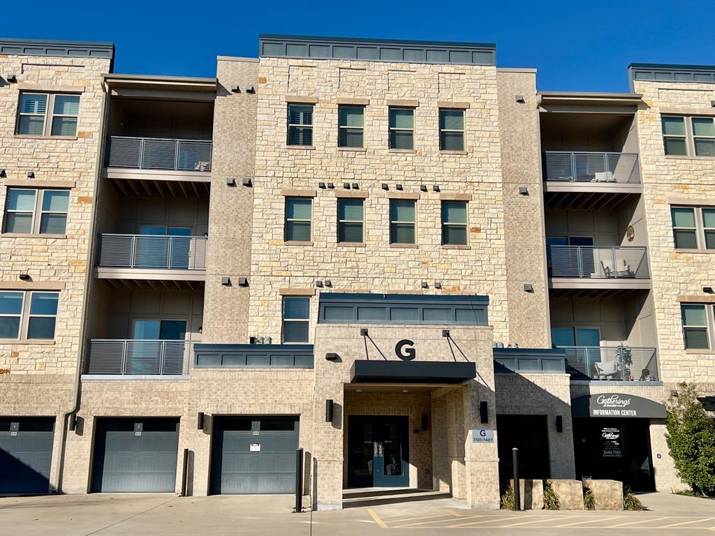 a front view of a building with glass windows