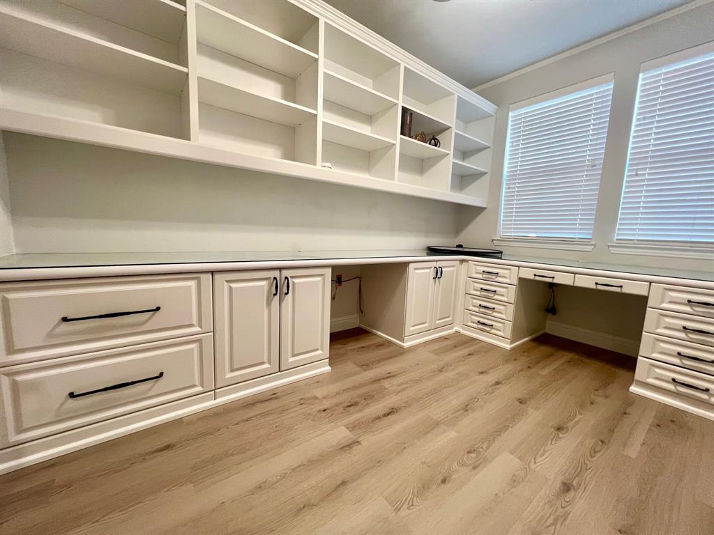 651 Watters Road, Unit 7101 Allen, TX 75013 - Photo 16 of 25 a view of a kitchen with a sink and cabinets