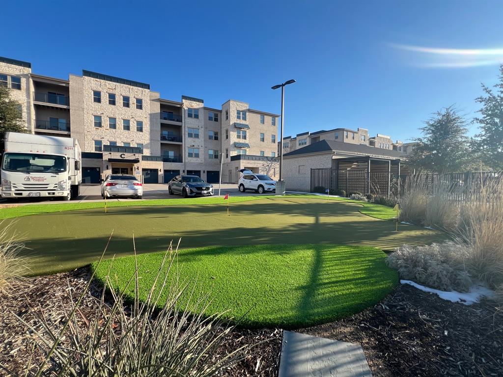 651 Watters Road, Unit 7101 Allen, TX 75013 - Photo 20 of 25 a view of a big house with a big yard and large trees