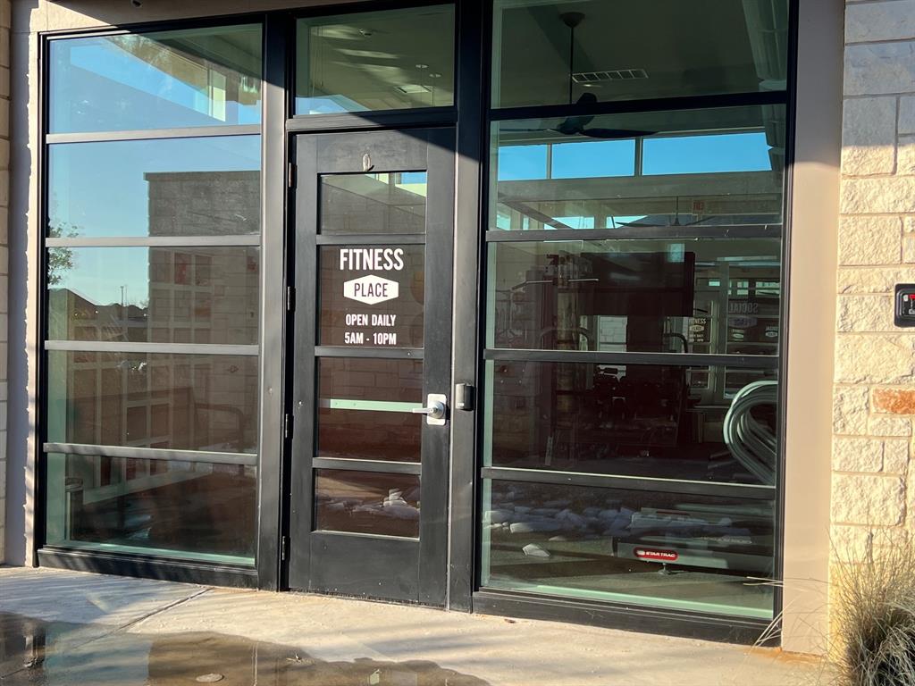 651 Watters Road, Unit 7101 Allen, TX 75013 - Photo 24 of 25 a view of a glass door of the house