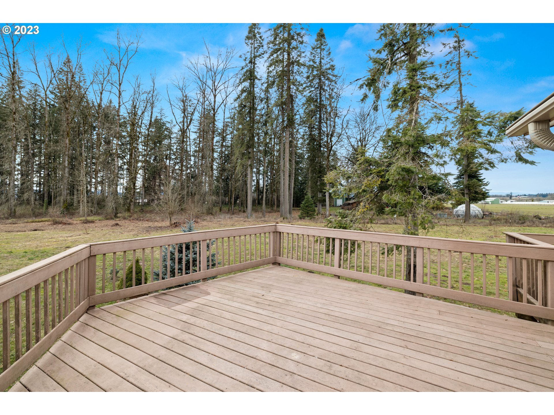 8880 Southwest River Road Hillsboro, OR 97123 - Photo 19 of 25 a view of balcony with wooden floor and fence
