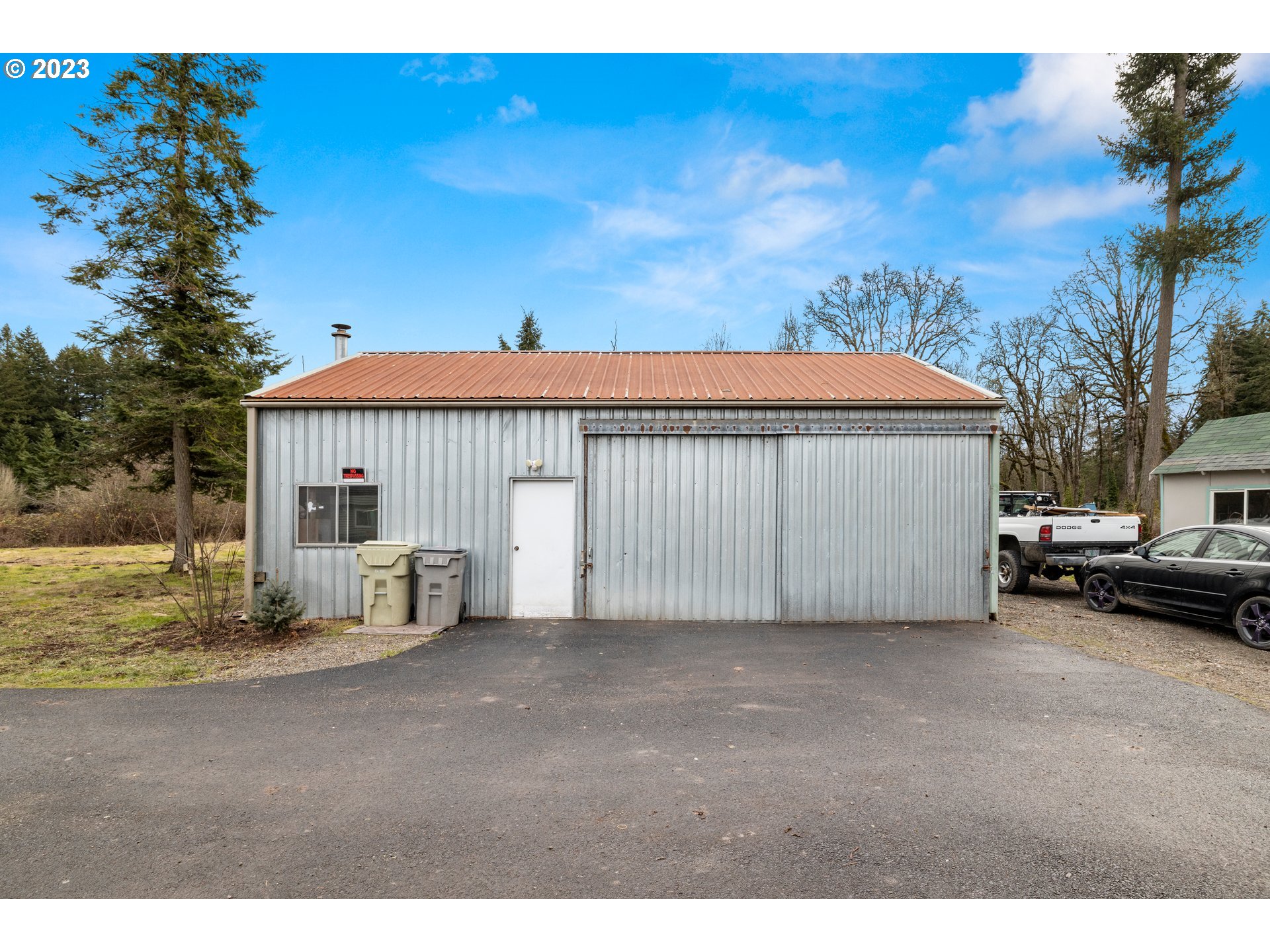 8880 Southwest River Road Hillsboro, OR 97123 - Photo 24 of 25 a view of a house with a yard