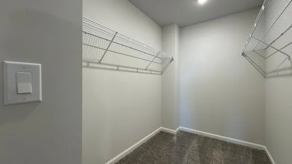 a bathroom with a double vanity sink and mirror
