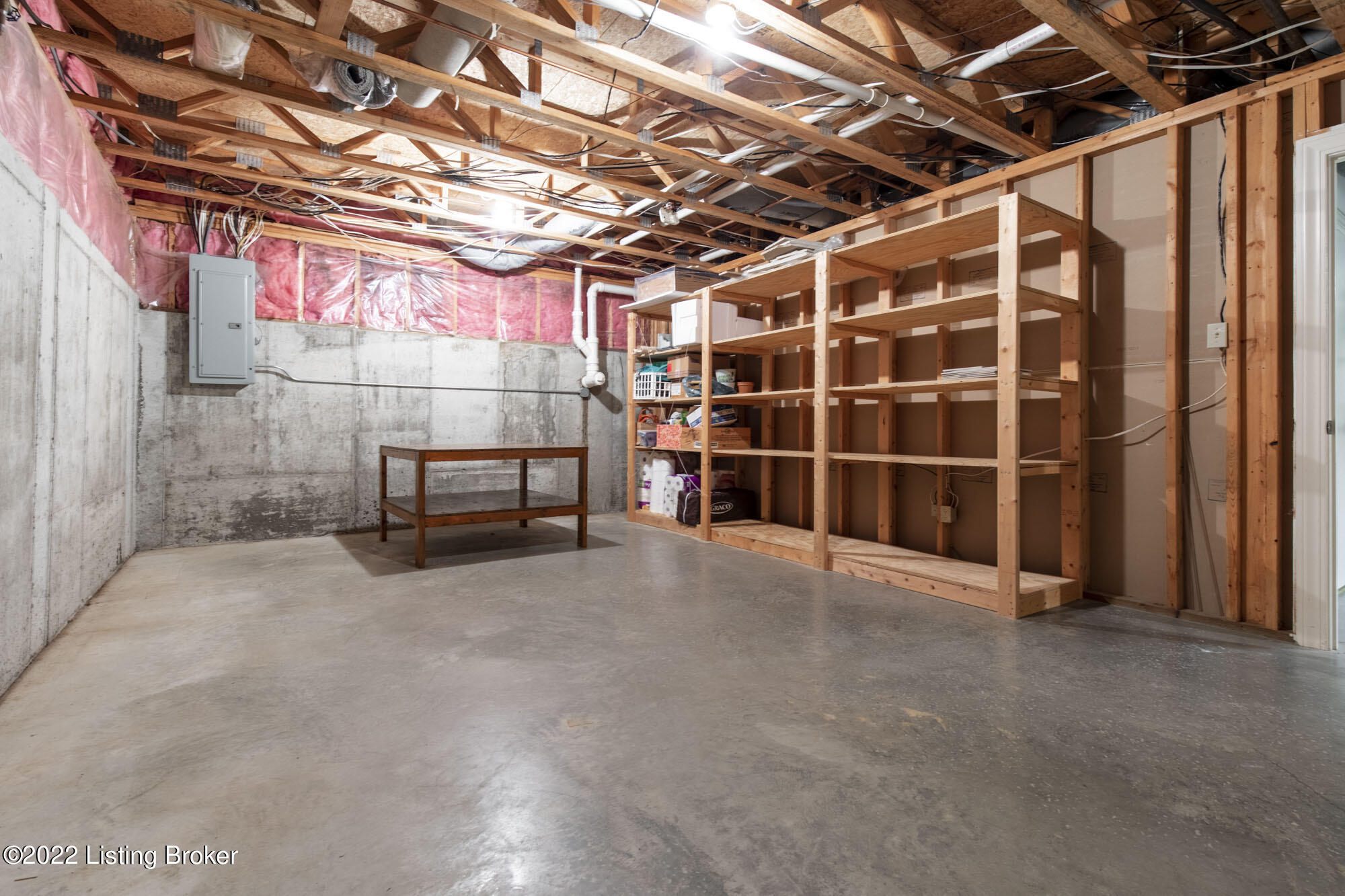 17208 Creek Ridge Road Louisville, KY 40245 - Photo 55 of 65 lower level craft room with storage shelving