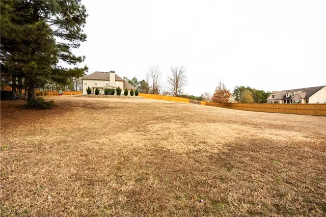 a view of ocean and trees