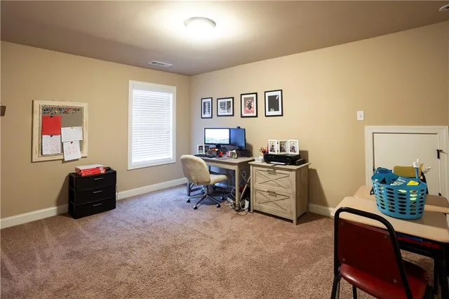 a room with furniture and a window