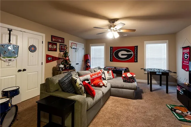 a living room with furniture and a window