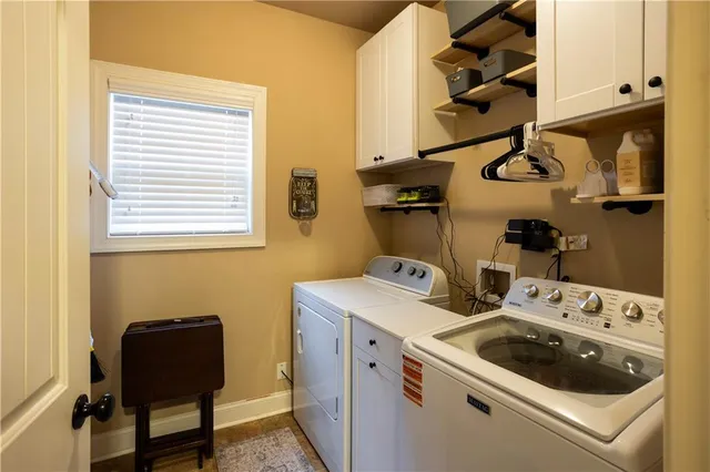 a utility room with dryer and washer