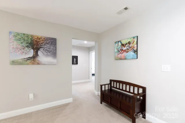 a large bathroom with a double vanity sink and a mirror
