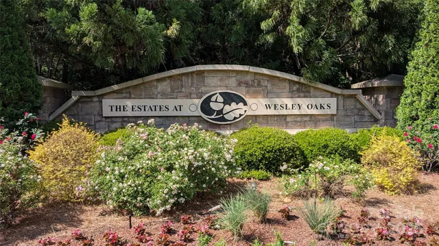a view of sign board and yard