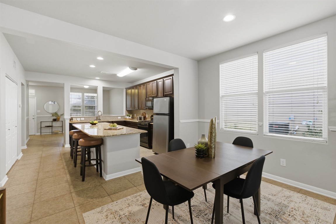 413 Shadow Point San Marcos, TX 78666 - Photo 12 of 34 The kitchen is perfectly positioned to connect seamlessly with versatile living and dining areas.