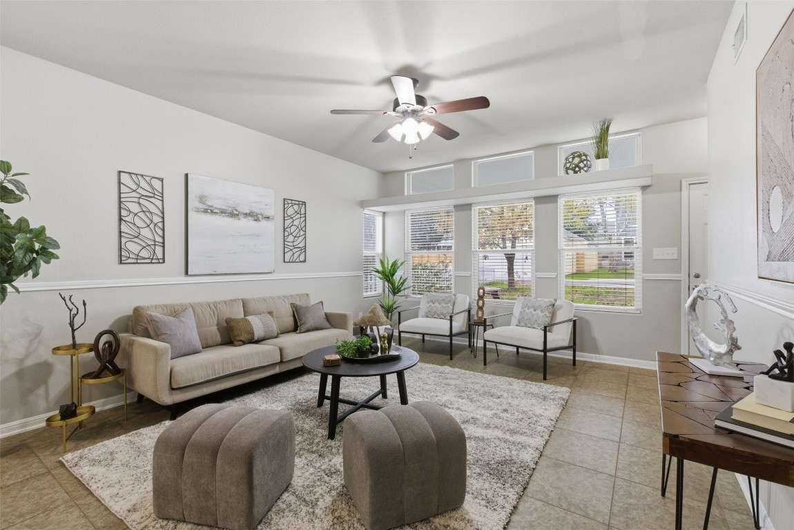 413 Shadow Point San Marcos, TX 78666 - Photo 14 of 34 The living room is warm and inviting.