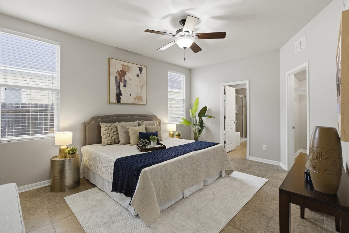 413 Shadow Point San Marcos, TX 78666 - Photo 18 of 34 The primary suite is a private retreat at the rear of the home.