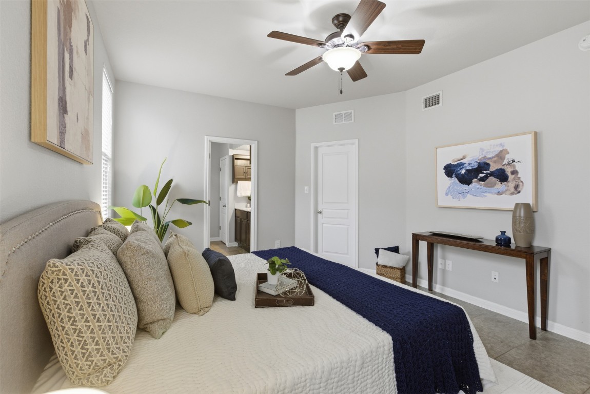413 Shadow Point San Marcos, TX 78666 - Photo 20 of 34 The walk-in closet is accessible from the bedroom.