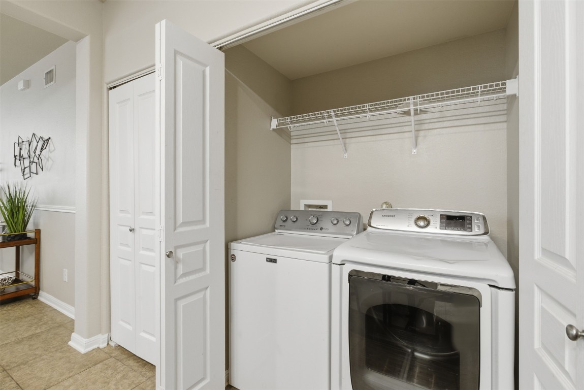 413 Shadow Point San Marcos, TX 78666 - Photo 27 of 34 The laundry is centrally located.