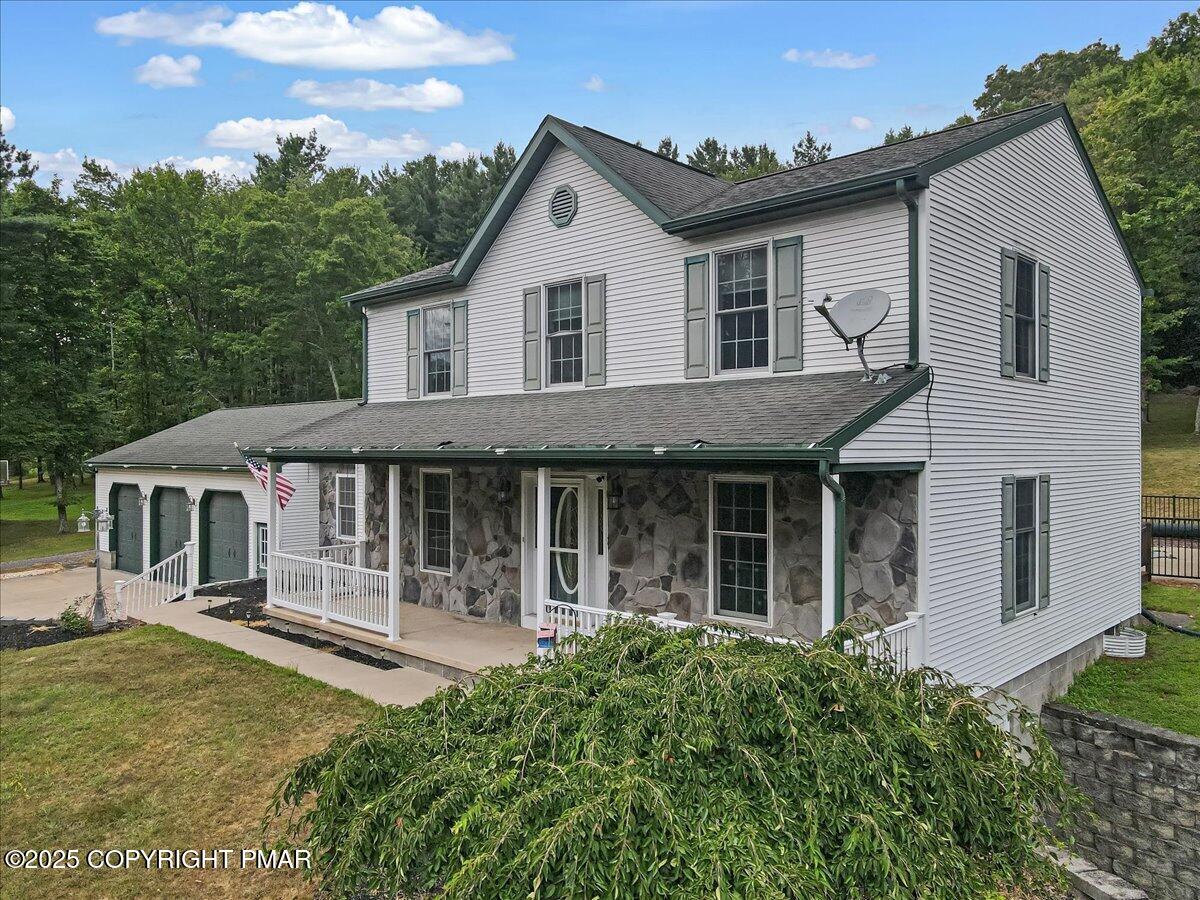 front view of a house with a yard