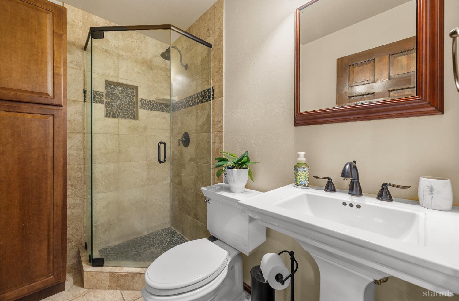 1121 Sundown Trail South Lake Tahoe, CA 96150 - Photo 14 of 40 a bathroom with a sink toilet and shower