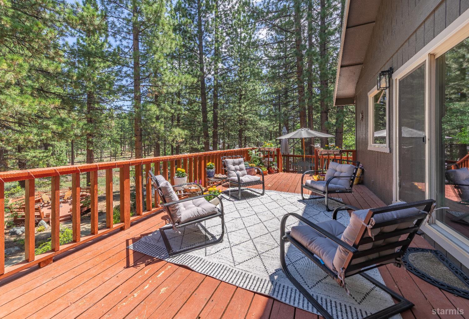 1121 Sundown Trail South Lake Tahoe, CA 96150 - Photo 16 of 40 a view of balcony with wooden floor and outdoor seating