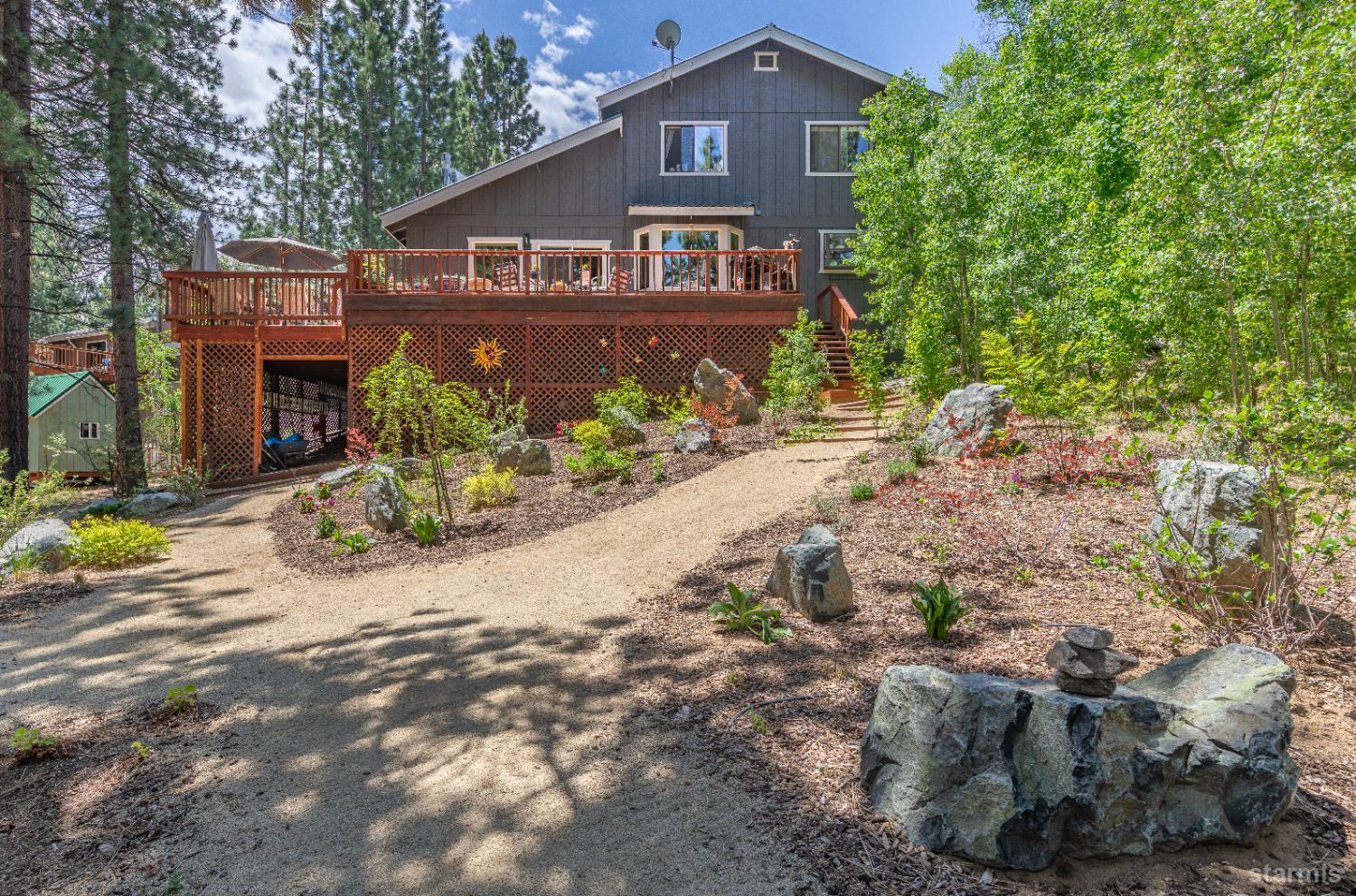 1121 Sundown Trail South Lake Tahoe, CA 96150 - Photo 27 of 40 a front view of a house with garden