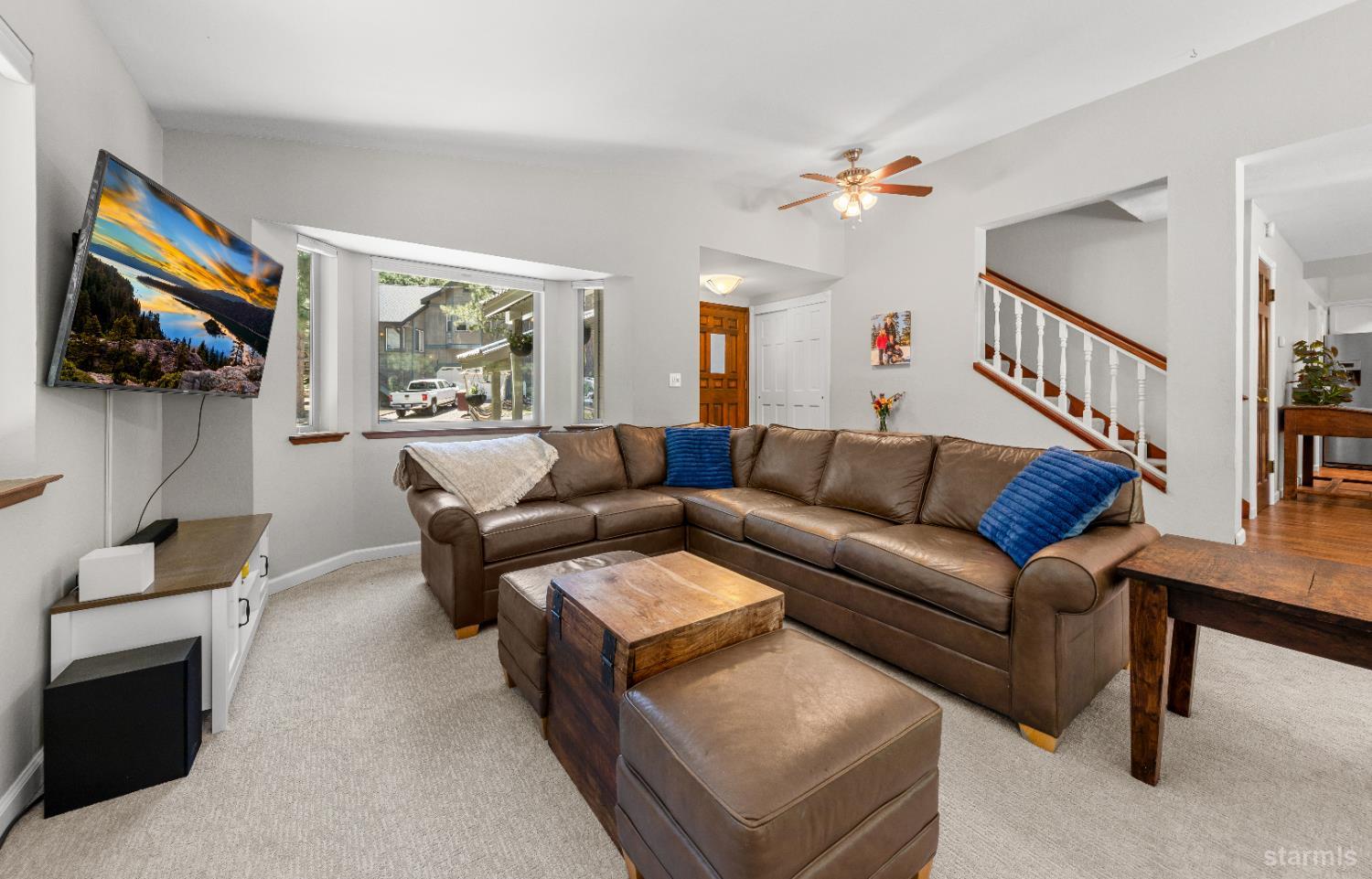 1121 Sundown Trail South Lake Tahoe, CA 96150 - Photo 5 of 40 a living room with furniture and a flat screen tv