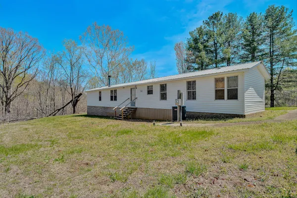 front view of a house with a big yard