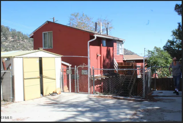 a front view of a house with a garage