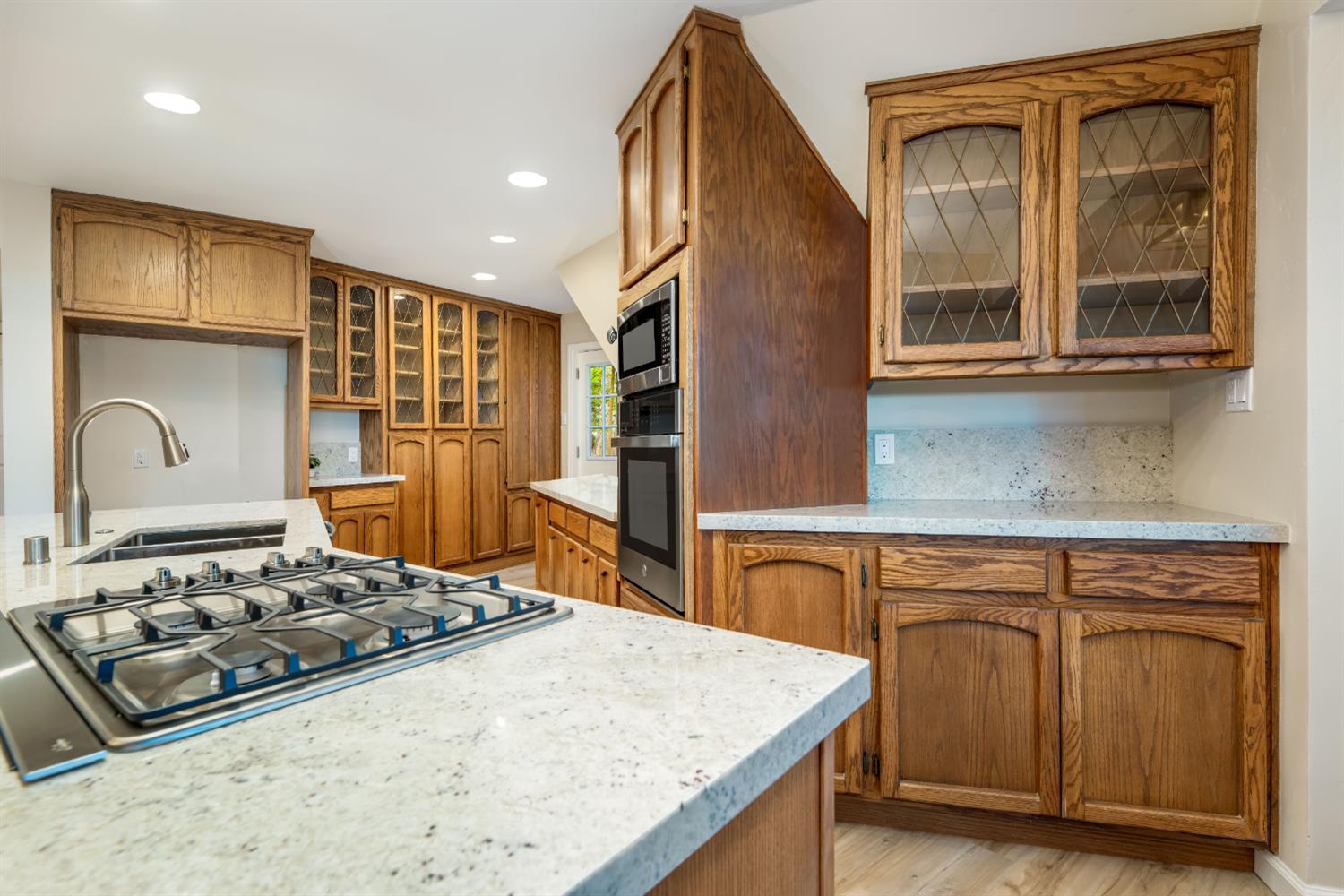 13008 Summit Ridge Drive Nevada City, CA 95959 - Photo 25 of 65 a kitchen with sink stove and cabinets