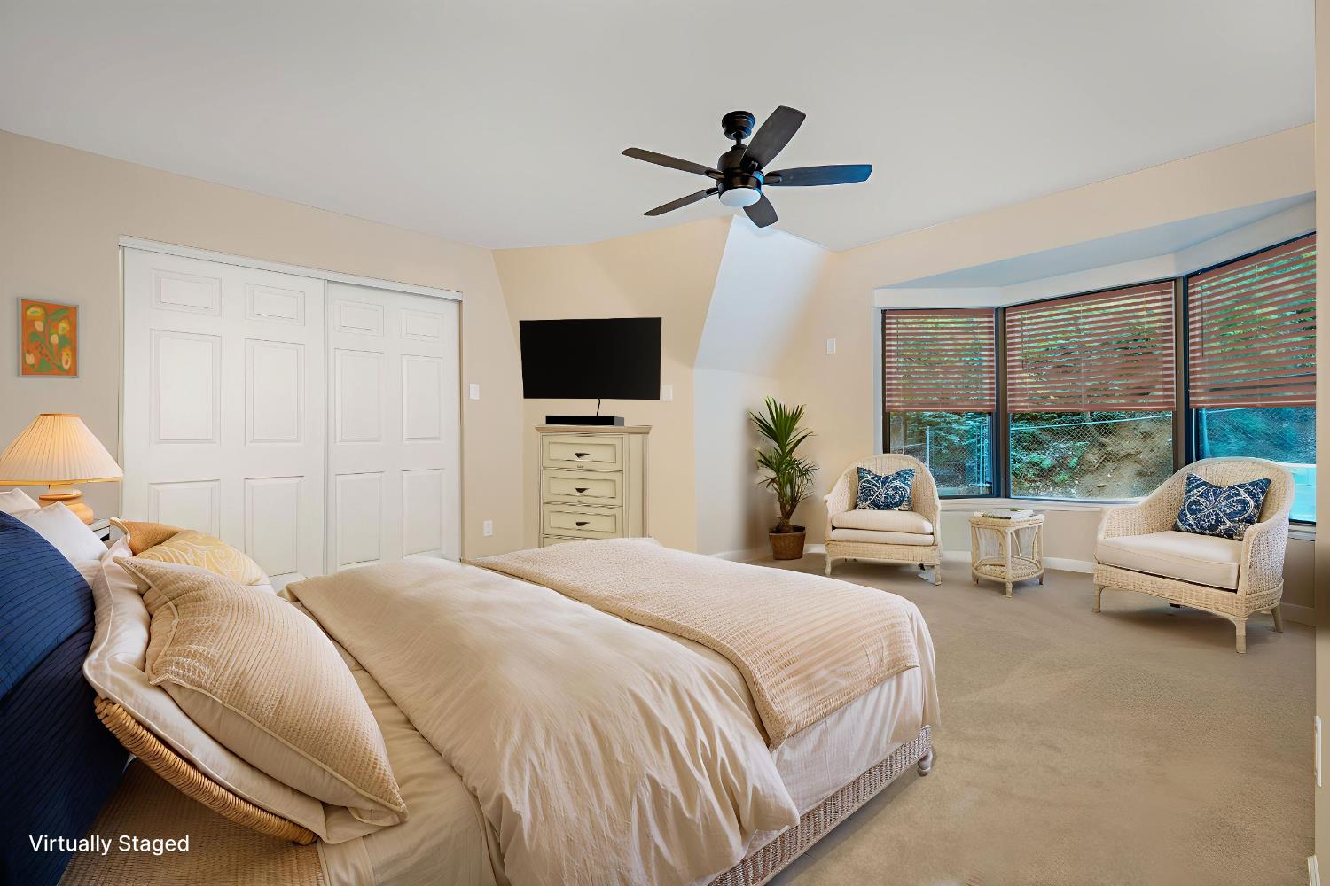 13008 Summit Ridge Drive Nevada City, CA 95959 - Photo 31 of 65 a bedroom with a bed and a flat screen tv