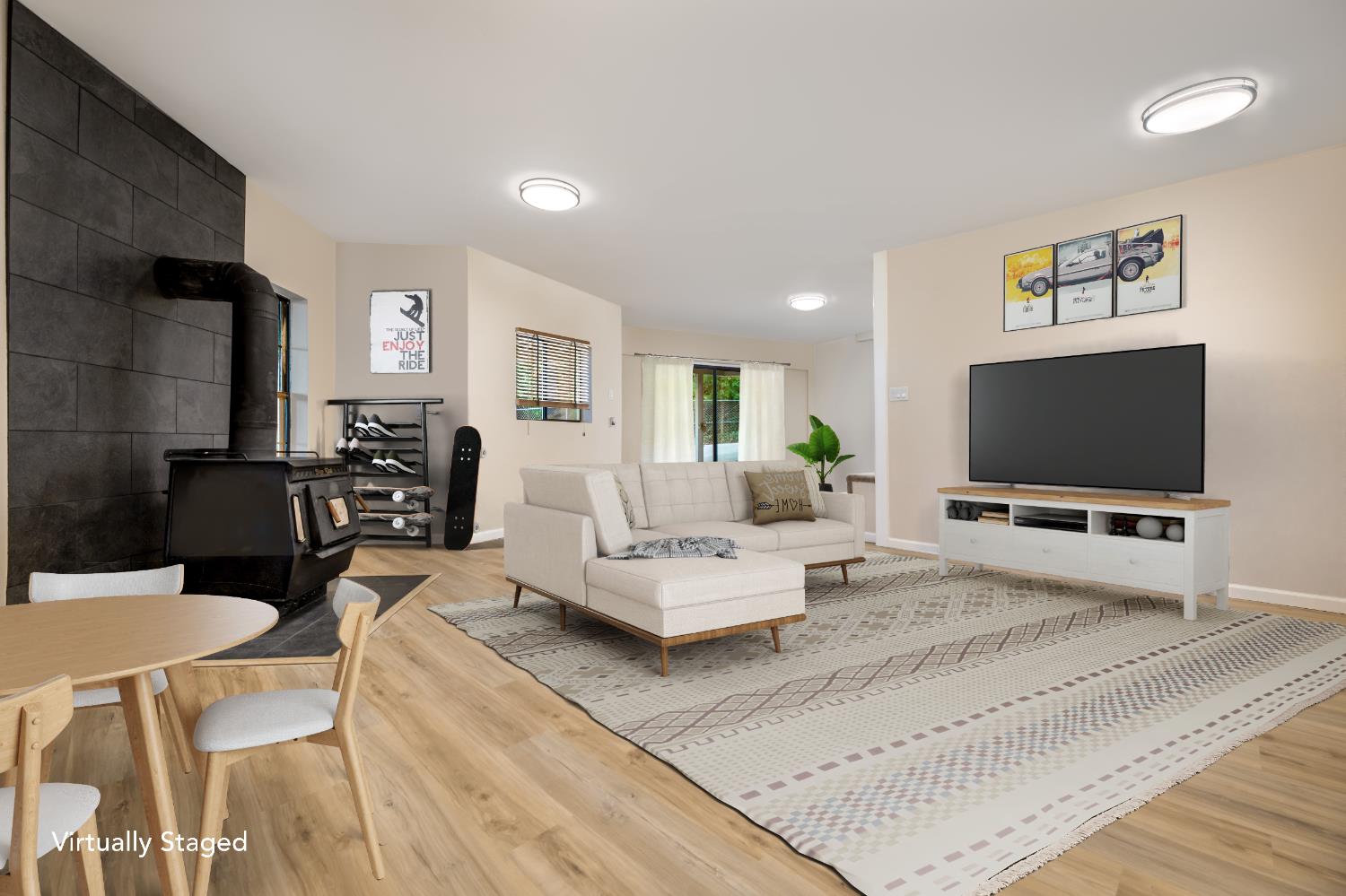13008 Summit Ridge Drive Nevada City, CA 95959 - Photo 45 of 65 a living room with furniture and a flat screen tv