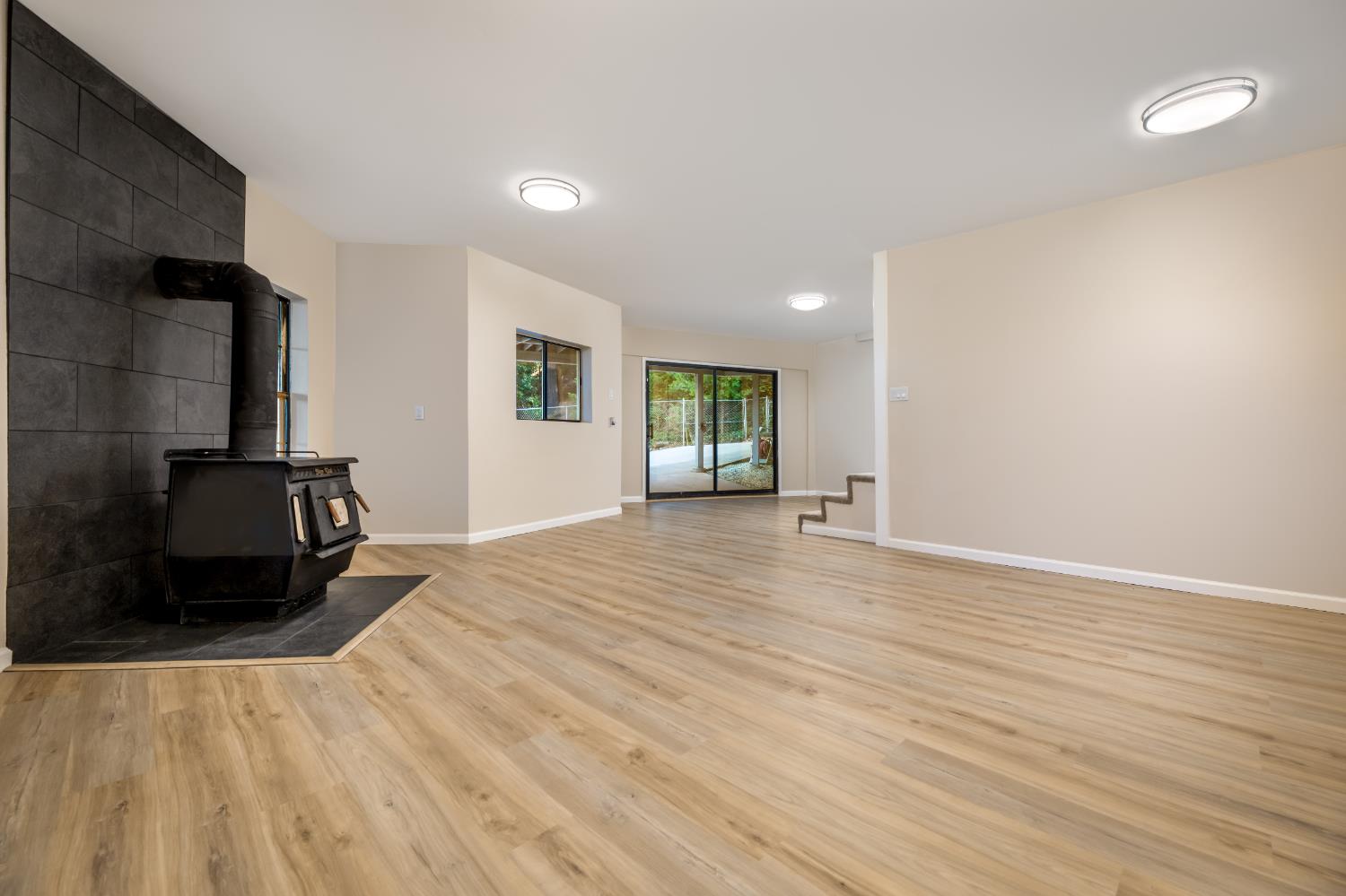 13008 Summit Ridge Drive Nevada City, CA 95959 - Photo 46 of 65 a view of empty room with wooden floor