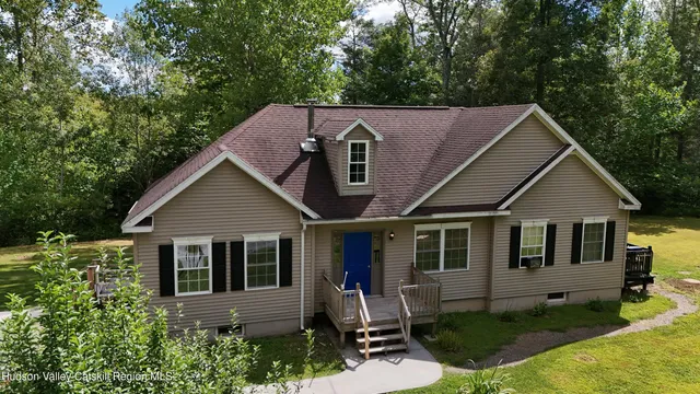 a house view with a garden space