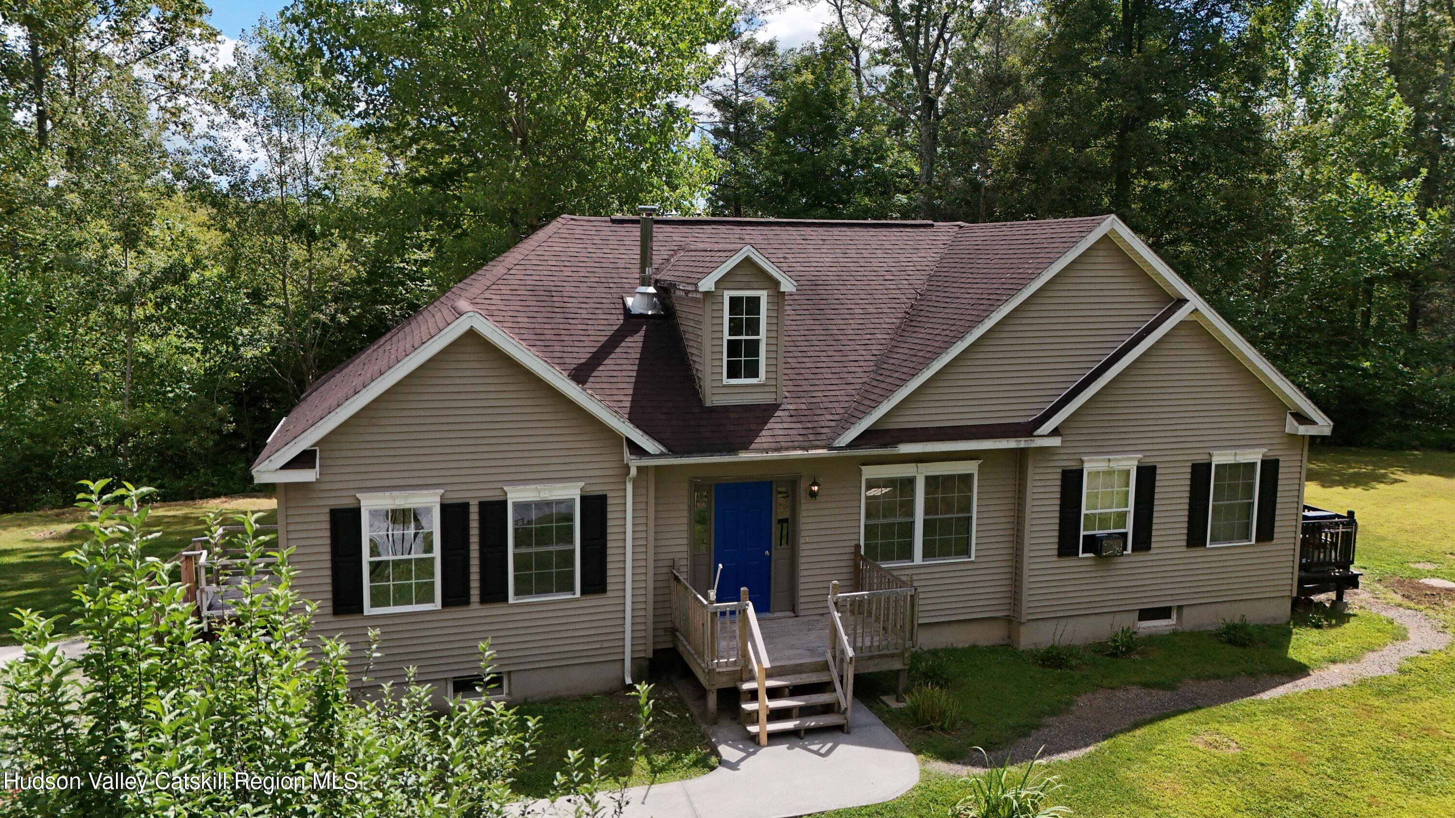 83 Buffalo Road Saugerties, NY 12477 - Photo 1 of 54 a house view with a garden space