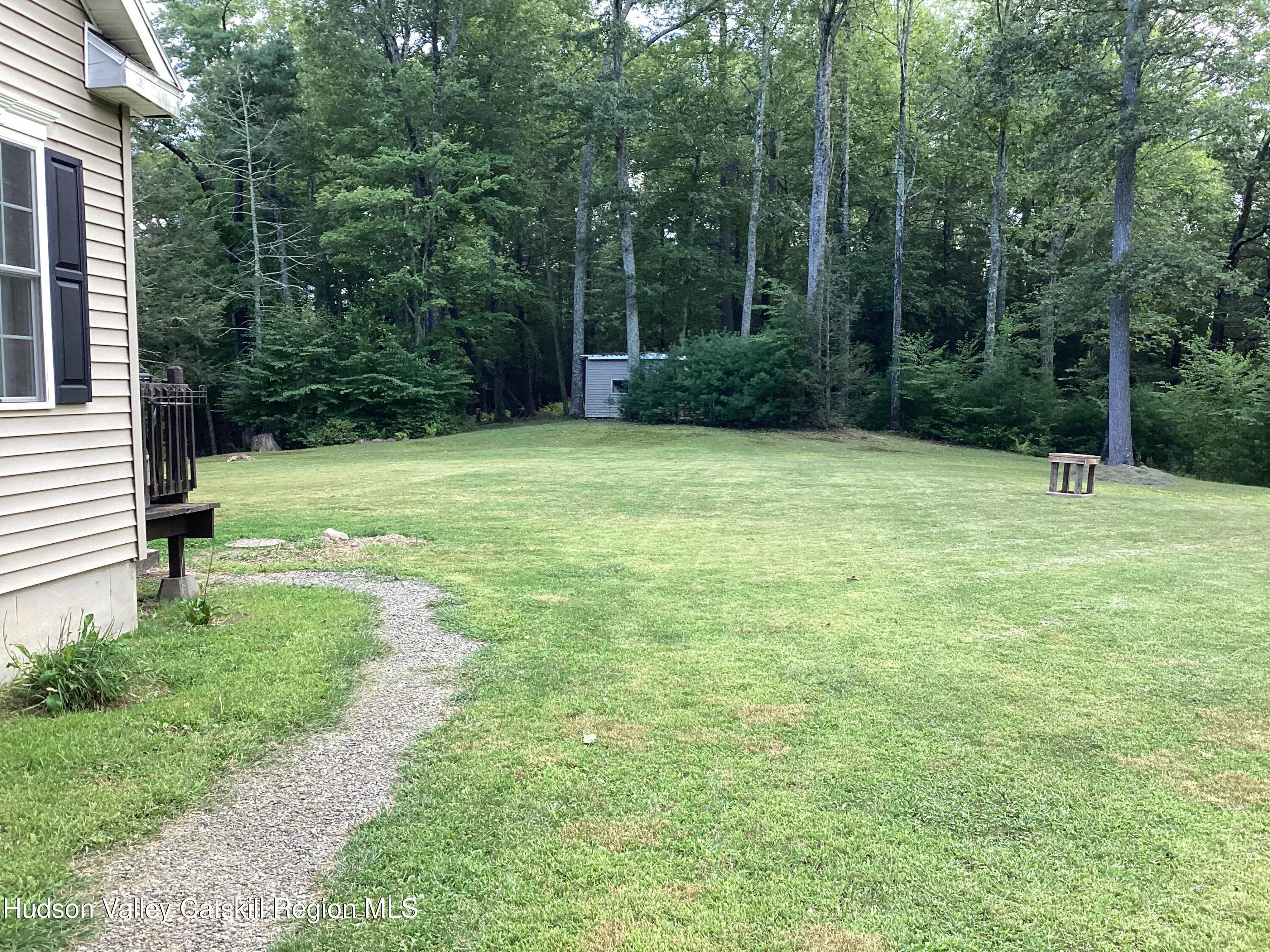 83 Buffalo Road Saugerties, NY 12477 - Photo 37 of 54 a view of a backyard with large trees