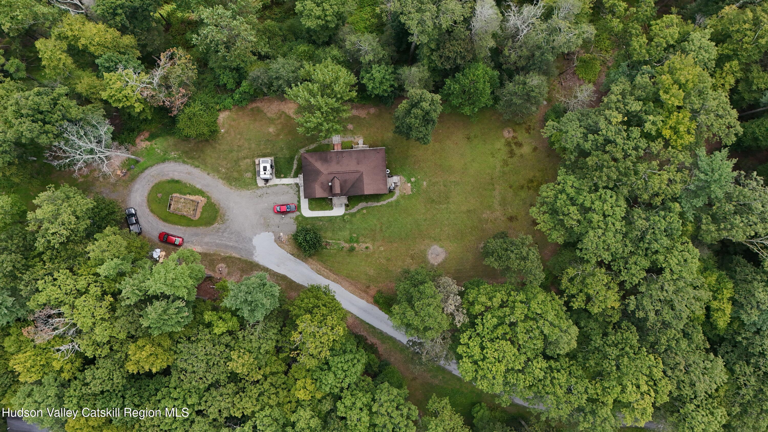 83 Buffalo Road Saugerties, NY 12477 - Photo 39 of 54 an aerial view of a house with a yard and lake view